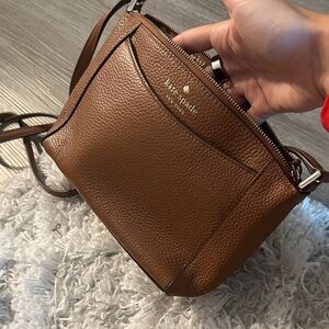 kate spade brown pebbled leather crossbody with front slip pocket